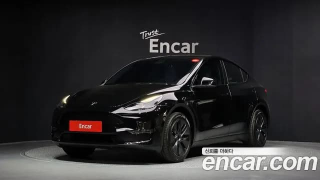 2024 Tesla Model Y Long Range AWD Sold VIN LRWYGCEK4RC700137 – rear exterior 2024 Tesla Model Y Long Range AWD Sold VIN LRWYGCEK4RC700137 – rear exterior