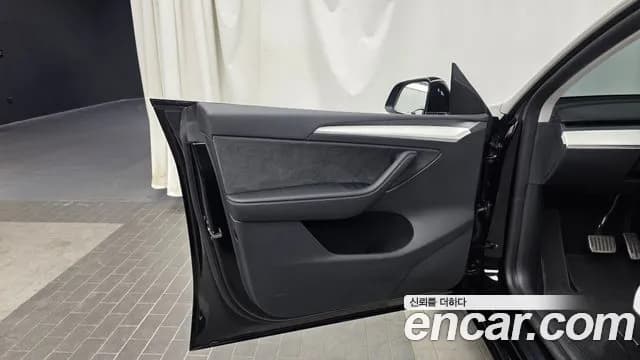 2024 Tesla Model Y Long Range AWD Sold VIN LRWYGCEK4RC700137 – exterior detail 2024 Tesla Model Y Long Range AWD Sold VIN LRWYGCEK4RC700137 – exterior detail