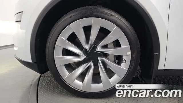 2025 Tesla Model Y Long Range AWD Sold VIN LRWYGCEKXSC065446 – exterior detail 2025 Tesla Model Y Long Range AWD Sold VIN LRWYGCEKXSC065446 – exterior detail