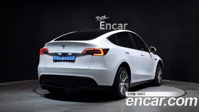 2023 Tesla Model Y RWD Sold VIN LRWYGCFS0PC131332 – front exterior 2023 Tesla Model Y RWD Sold VIN LRWYGCFS0PC131332 – front exterior