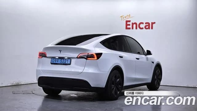2023 Tesla Model Y RWD Sold VIN LRWYGCFS2PC075734 – rear exterior 2023 Tesla Model Y RWD Sold VIN LRWYGCFS2PC075734 – rear exterior