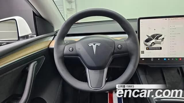 2023 Tesla Model Y RWD Sold VIN LRWYGCFS2PC075734 – interior seats 2023 Tesla Model Y RWD Sold VIN LRWYGCFS2PC075734 – interior seats