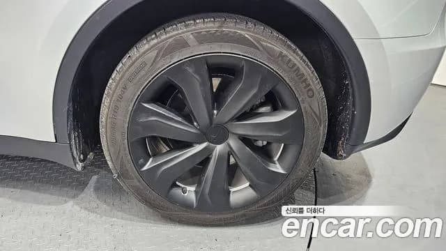 2023 Tesla Model Y RWD Sold VIN LRWYGCFS2PC075734 – exterior detail 2023 Tesla Model Y RWD Sold VIN LRWYGCFS2PC075734 – exterior detail