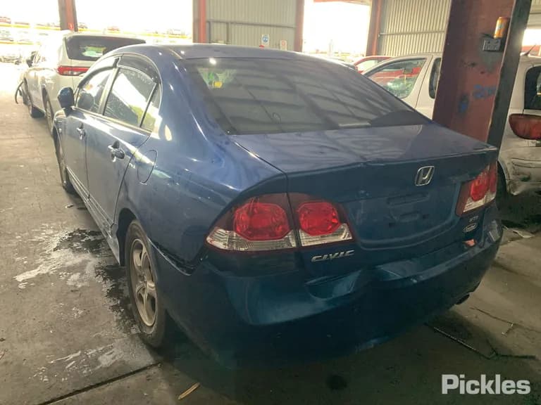 2010 Honda Civic Used VIN MRHFD1650AP021735 – rear exterior 2010 Honda Civic Used VIN MRHFD1650AP021735 – rear exterior