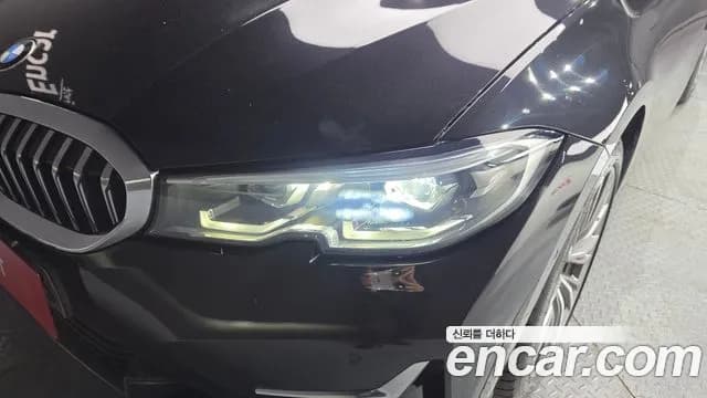 2021 BMW 3 Series (G20) 320i Luxury Sold VIN WBA5X5108MFL04545 – side profile 2021 BMW 3 Series (G20) 320i Luxury Sold VIN WBA5X5108MFL04545 – side profile