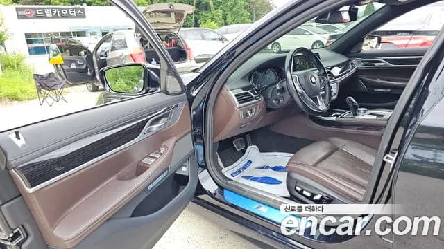 2018 BMW 7Series (G11) 740Li xDrive M Sport Package Sold VIN WBA7E4105JGV25924 – rear exterior 2018 BMW 7Series (G11) 740Li xDrive M Sport Package Sold VIN WBA7E4105JGV25924 – rear exterior