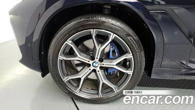 2022 BMW X6 (G06) xDrive40i M Sport Sold VIN WBACY6105N9L38856 – side profile 2022 BMW X6 (G06) xDrive40i M Sport Sold VIN WBACY6105N9L38856 – side profile