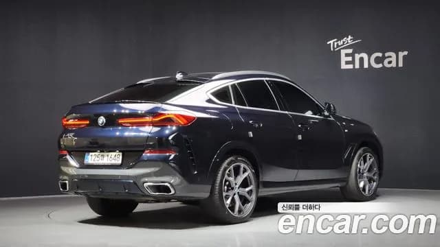 2021 BMW X6 (G06) xDrive40i M Sport Sold VIN WBACY610XM9E50876 – rear exterior 2021 BMW X6 (G06) xDrive40i M Sport Sold VIN WBACY610XM9E50876 – rear exterior