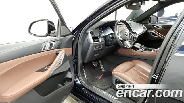 2021 BMW X6 (G06) xDrive40i M Sport Sold VIN WBACY610XM9E50876 – side profile 2021 BMW X6 (G06) xDrive40i M Sport Sold VIN WBACY610XM9E50876 – side profile