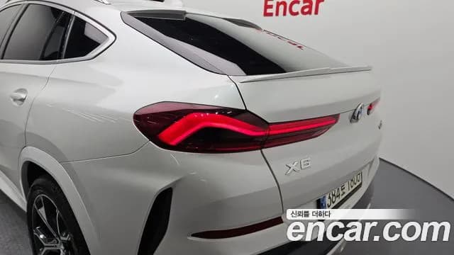 2022 BMW X6 (G06) xDrive30d M Sport Sold VIN WBAGT8107N9M67161 – side profile 2022 BMW X6 (G06) xDrive30d M Sport Sold VIN WBAGT8107N9M67161 – side profile