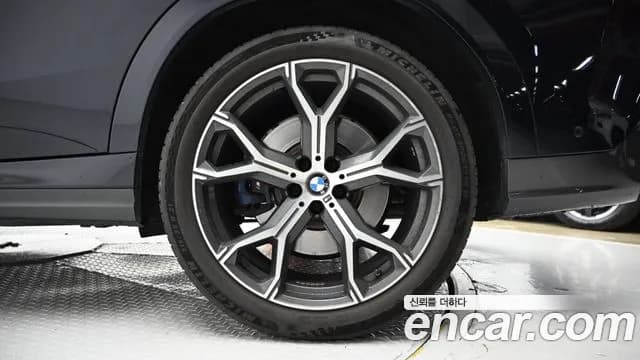 2021 BMW X6 (G06) xDrive30d M Sport Sold VIN WBAGT810MX9E57421 – side profile 2021 BMW X6 (G06) xDrive30d M Sport Sold VIN WBAGT810MX9E57421 – side profile