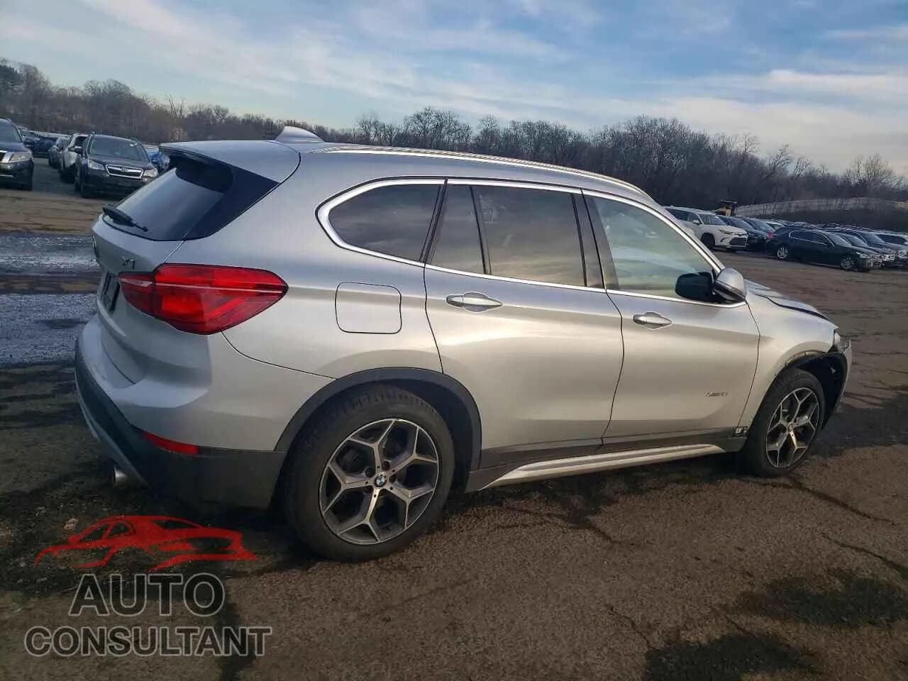 2018 BMW X1 Damaged VIN WBXHT3C32J5L24222 – side profile 2018 BMW X1 Damaged VIN WBXHT3C32J5L24222 – side profile