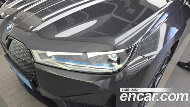 2023 BMW iX xDrive50 Sports Plus Sold VIN WBY21CF06PCL46205 – side profile 2023 BMW iX xDrive50 Sports Plus Sold VIN WBY21CF06PCL46205 – side profile