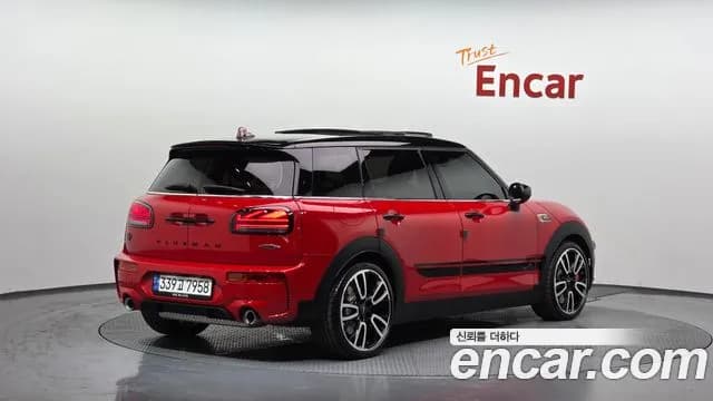 2023 Mini Cooper S Clubman JCW Sold VIN WMWJZ9103P2T47072 – side profile 2023 Mini Cooper S Clubman JCW Sold VIN WMWJZ9103P2T47072 – side profile