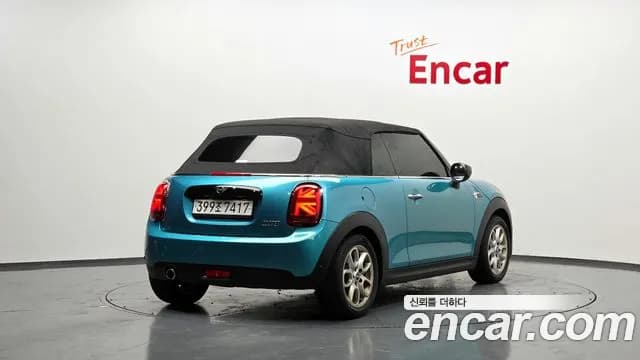 2021 Mini Cooper Convertible Standard Sold VIN WMWWJ7101M3M75267 – side profile 2021 Mini Cooper Convertible Standard Sold VIN WMWWJ7101M3M75267 – side profile