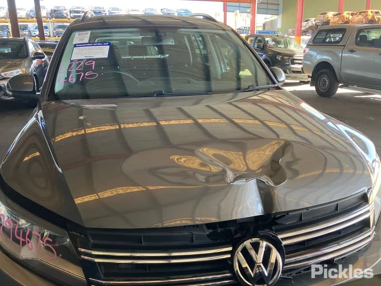 2014 Volkswagen Tiguan Used VIN WVGZZZ5NZEW095525 – rear exterior 2014 Volkswagen Tiguan Used VIN WVGZZZ5NZEW095525 – rear exterior