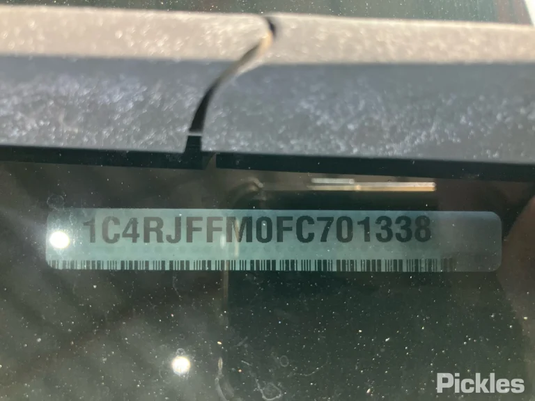 2015 Jeep Grand Cherokee Damaged VIN 1C4RJFFM0FC701338 – side profile