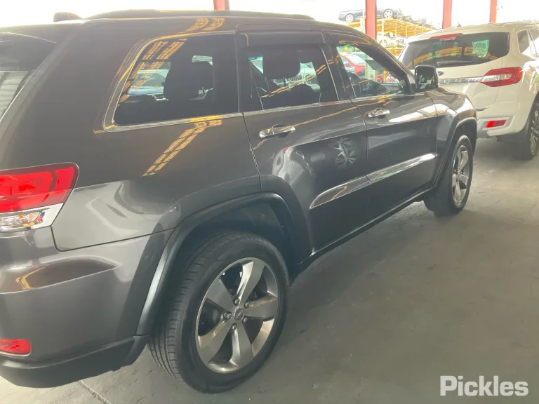 2013 Jeep Grand Cherokee Damaged VIN 1C4RJFFM9EC189058 – trunk area
