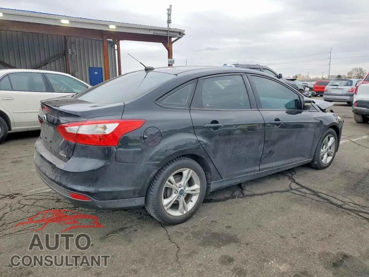 2014 FORD FOCUS Damaged VIN 1FADP3F21EL123390 – side profile