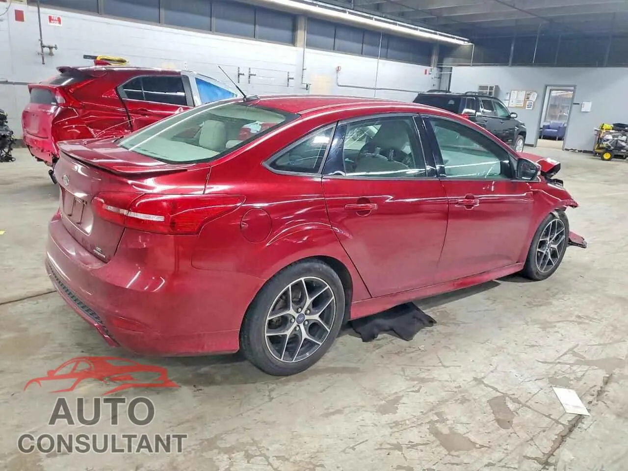 2015 FORD FOCUS Damaged VIN 1FADP3F21FL248049 – side profile