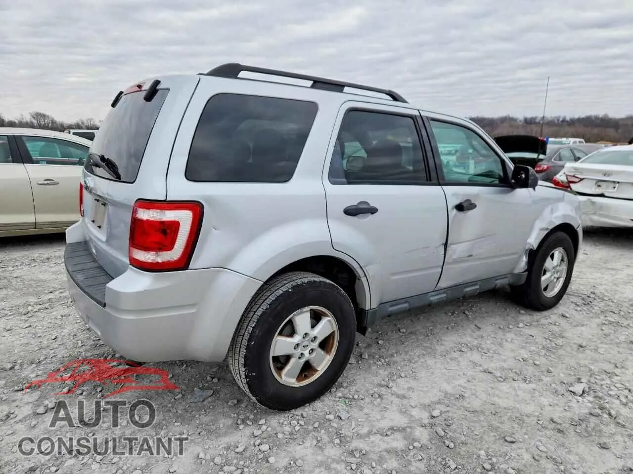 2011 FORD ESCAPE Damaged VIN 1FMCU0D7XBKA98126 – side profile