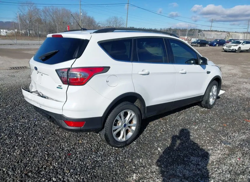 2017 FORD Escape Used VIN 1FMCU0GD2HUB50959 – side profile