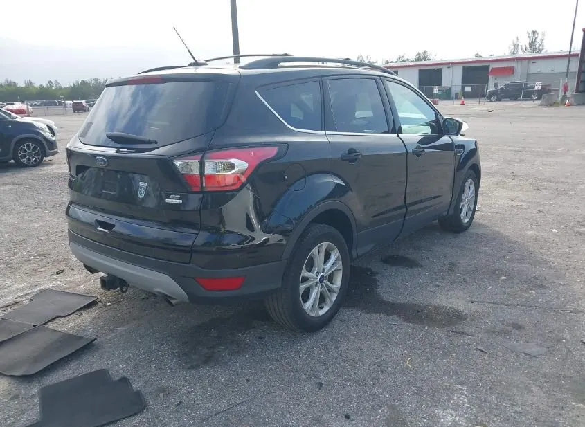 2018 FORD Escape Used VIN 1FMCU0GD8JUB47649 – trunk area