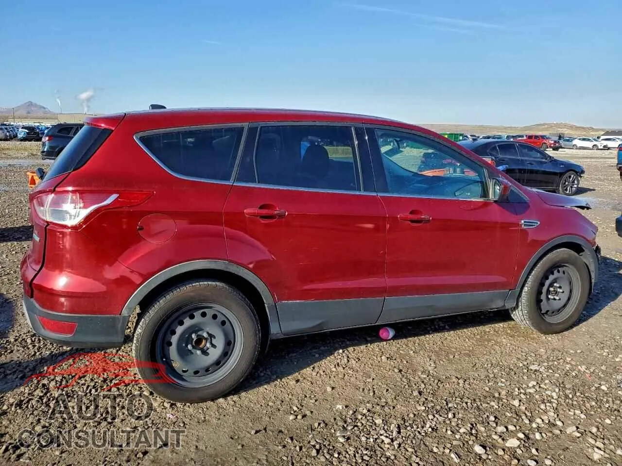 2015 FORD ESCAPE Damaged VIN 1FMCU0GX2FUA43479 – side profile