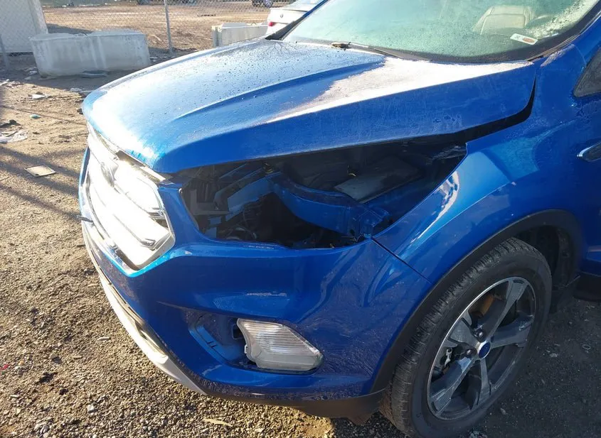 2018 FORD Escape Used VIN 1FMCU9HD7JUB86512 – side profile