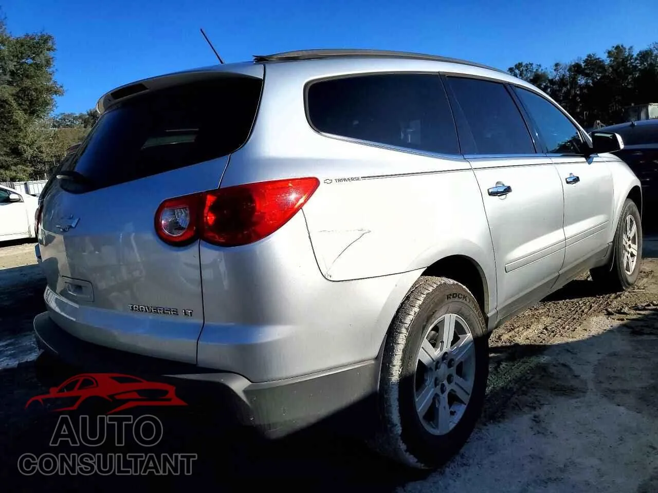 2012 CHEVROLET TRAVERSE Damaged VIN 1GNKRGED9CJ342636 – side profile