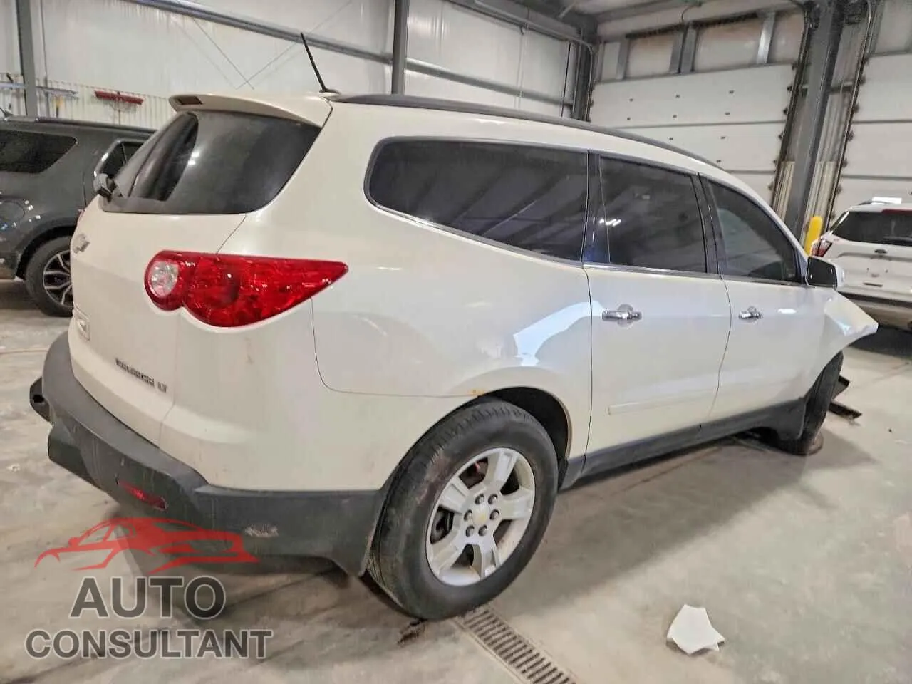 2012 CHEVROLET TRAVERSE Damaged VIN 1GNKVGED2CJ160014 – side profile