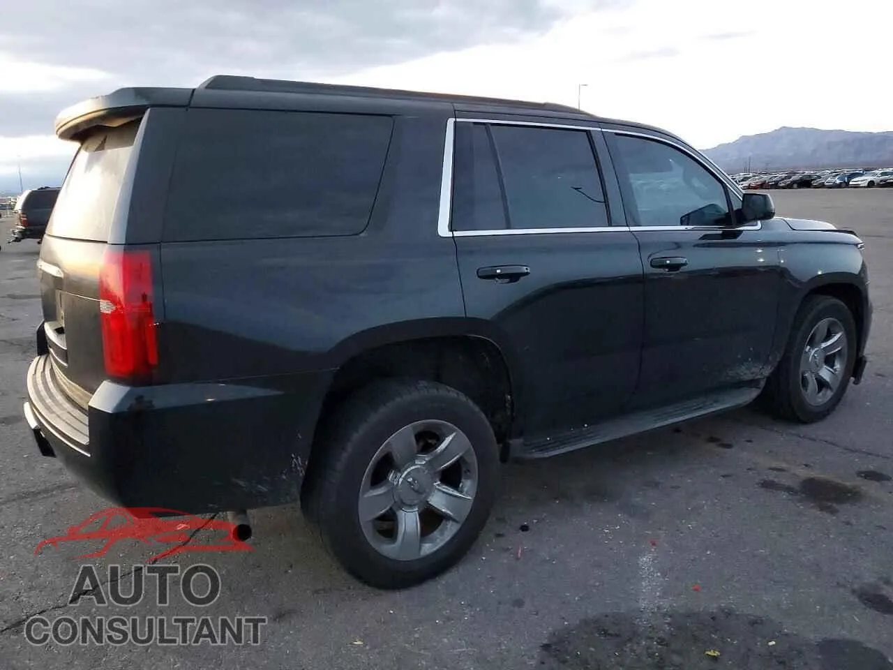 2015 CHEVROLET TAHOE Damaged VIN 1GNSCBKC3FR606049 – side profile