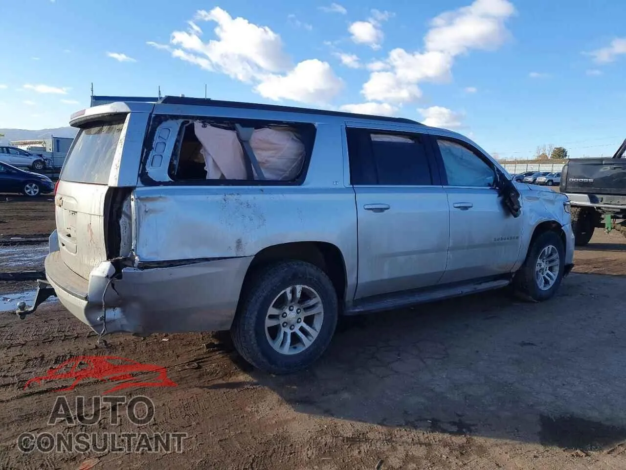 2016 CHEVROLET SUBURBAN Damaged VIN 1GNSKHKC1GR163701 – side profile