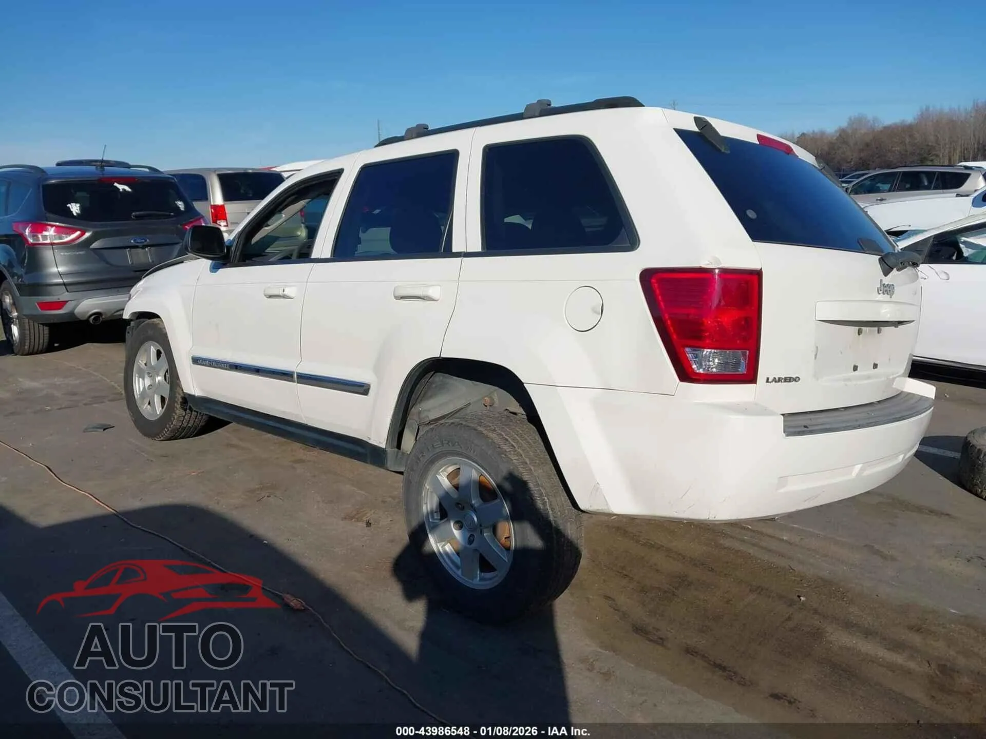 2010 JEEP GRAND CHEROKEE Damaged VIN 1J4PS4GK8AC154960 – side profile
