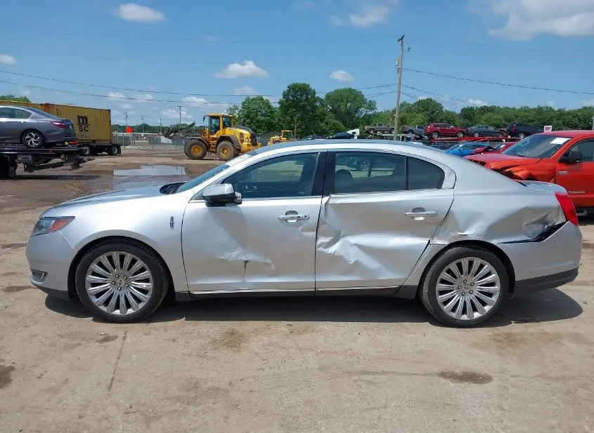 2013 LINCOLN MKS Used VIN 1LNHL9DK7DG605992 – trunk area