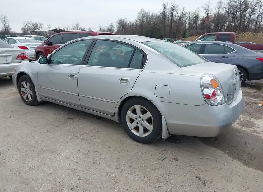 2004 NISSAN Altima Used VIN 1N4AL11D74C120679 – trunk area