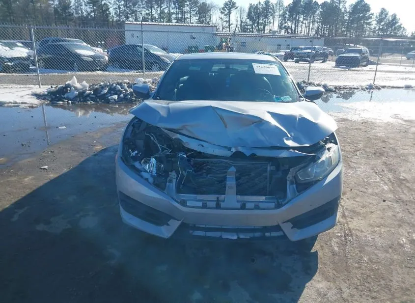 2016 HONDA Civic Used VIN 2HGFC4B07GH300180 – trunk area
