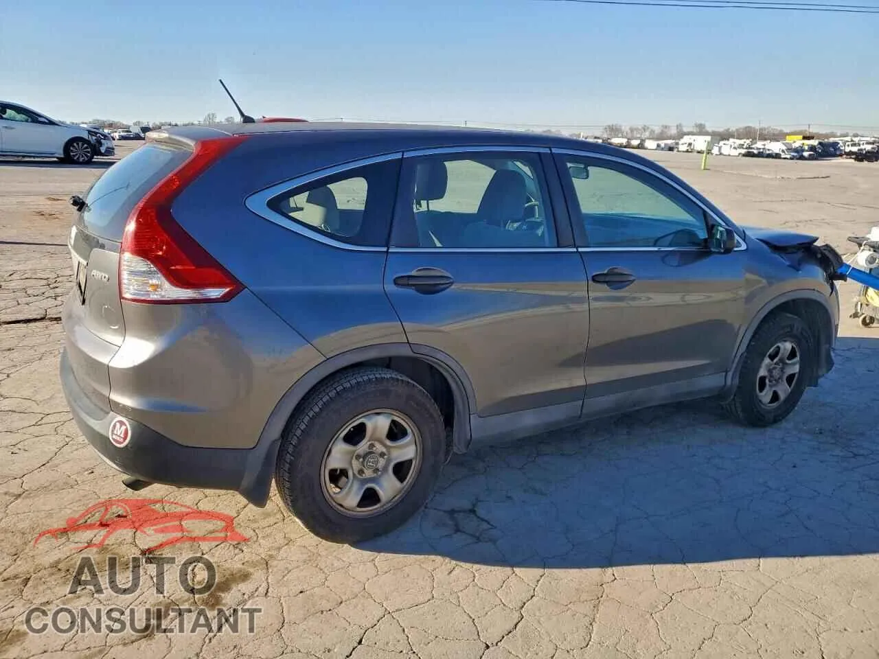 2013 HONDA CRV Damaged VIN 2HKRM4H37DH633217 – side profile