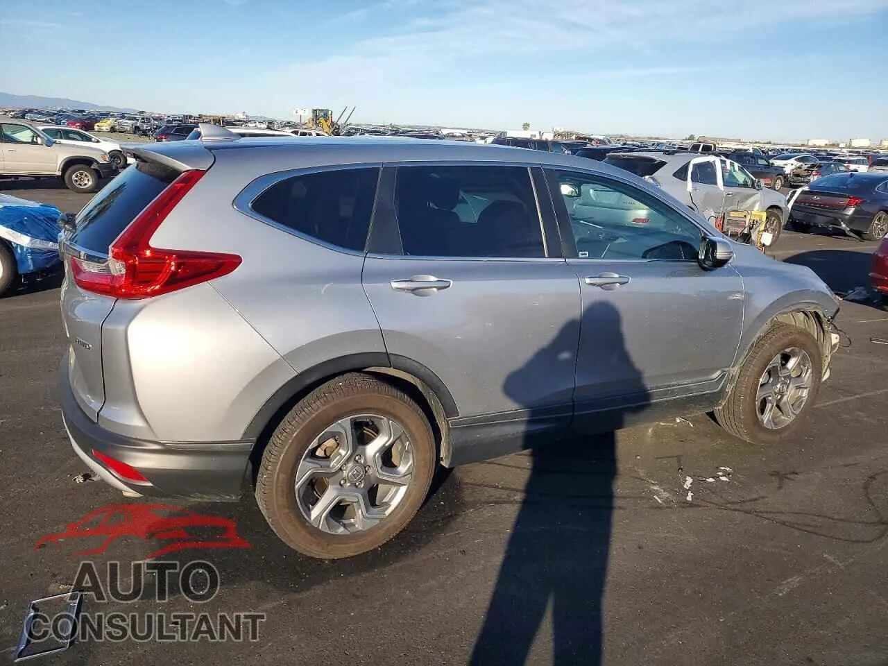 2017 HONDA CRV Damaged VIN 2HKRW2H84HH647205 – side profile