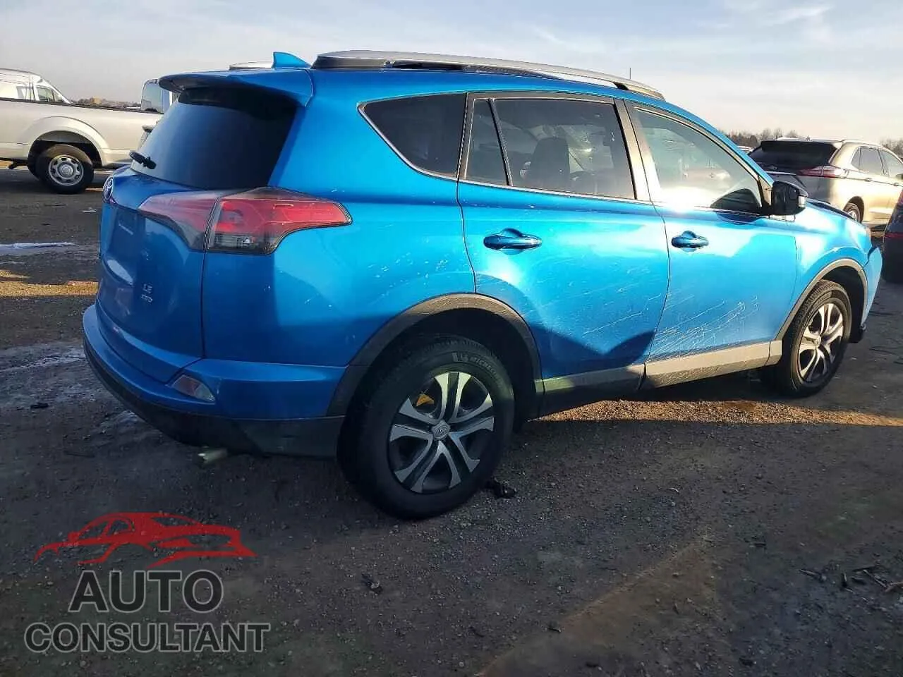 2016 TOYOTA RAV4 Damaged VIN 2T3BFREV6GW453514 – side profile