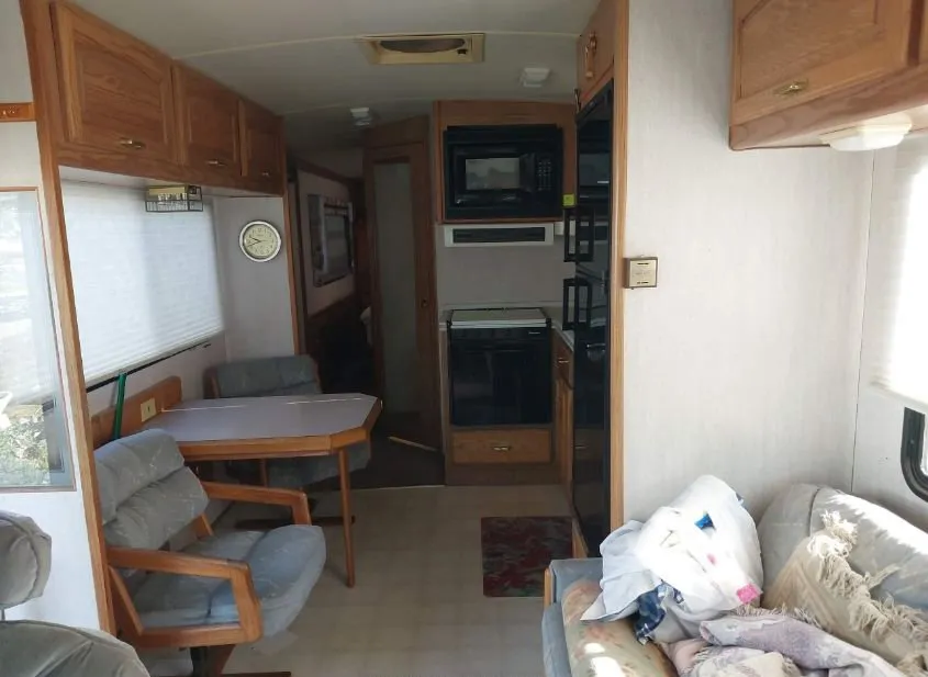 1993 FORD Recreational Vehicle Used VIN 3FCMF53G1PJA02631 – trunk area