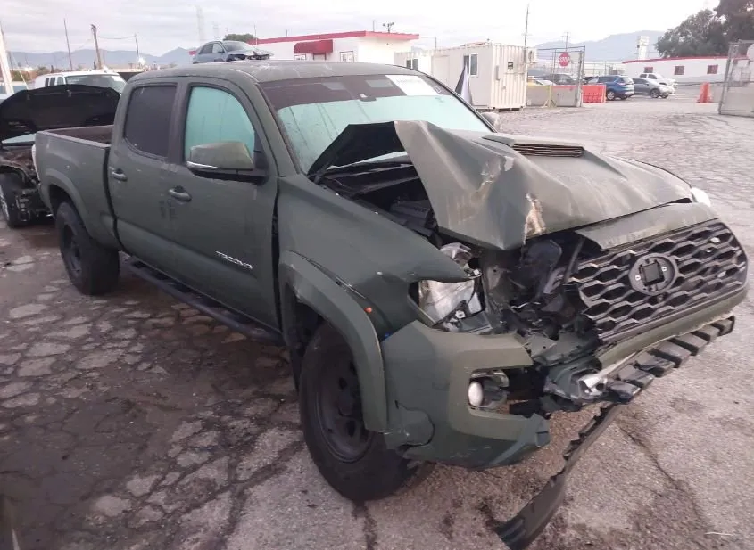 2022 TOYOTA Tacoma Used VIN 3TMBZ5DN4NM034674 – trunk area