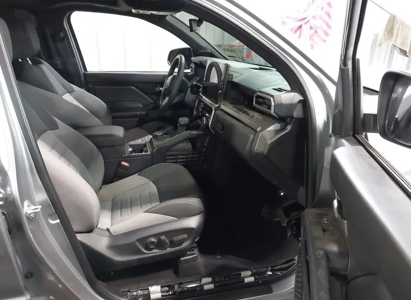2024 TOYOTA TACOMA Used VIN 3TMLB5JNXRM036979 – trunk area