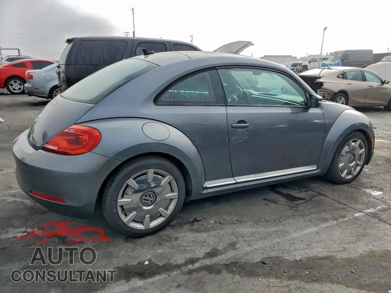 2012 VOLKSWAGEN BEETLE Damaged VIN 3VWJP7AT9CM651093 – side profile