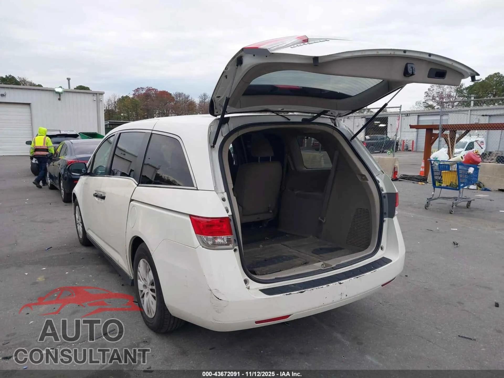 2014 HONDA ODYSSEY Damaged VIN 5FNRL5H2XEB003093 – side profile