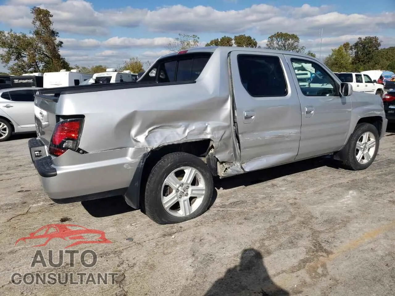 2012 HONDA RIDGELINE Damaged VIN 5FPYK1F52CB002626 – side profile