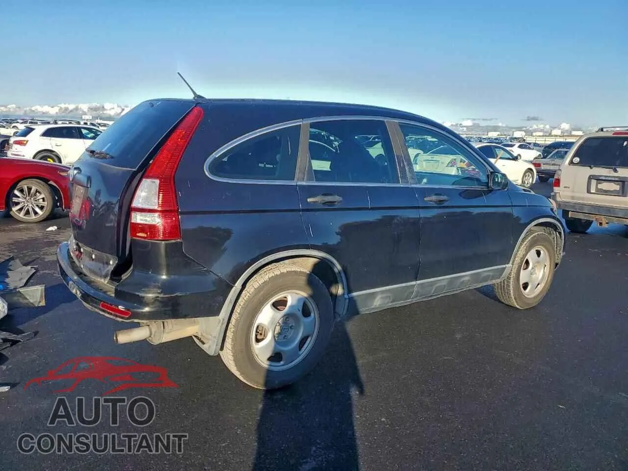 2010 HONDA CRV Damaged VIN 5J6RE3H33AL039751 – side profile