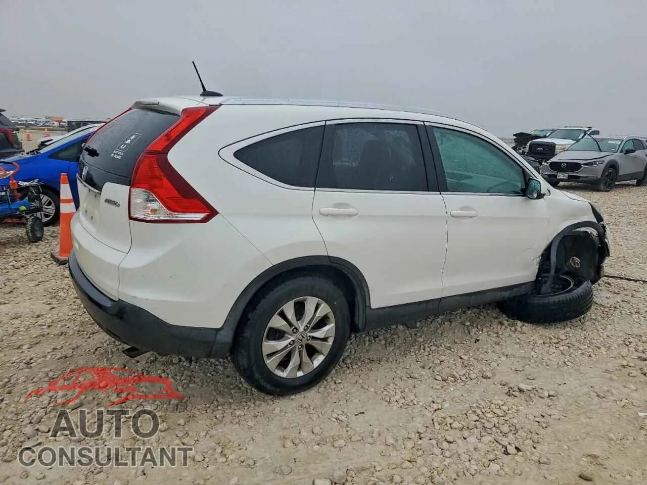2014 HONDA CRV Damaged VIN 5J6RM4H7XEL115256 – side profile