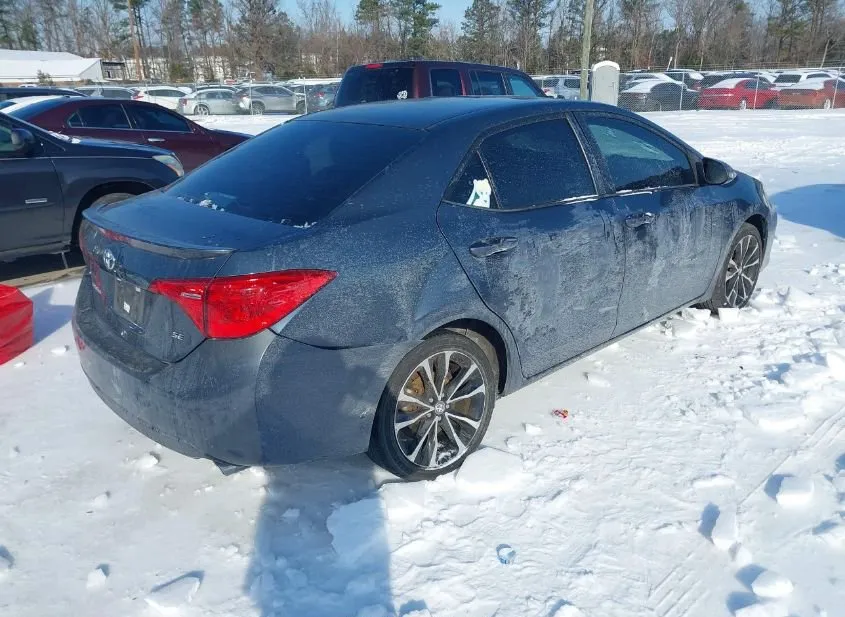 2018 TOYOTA Corolla Used VIN 5YFBURHE2JP790569 – rear exterior