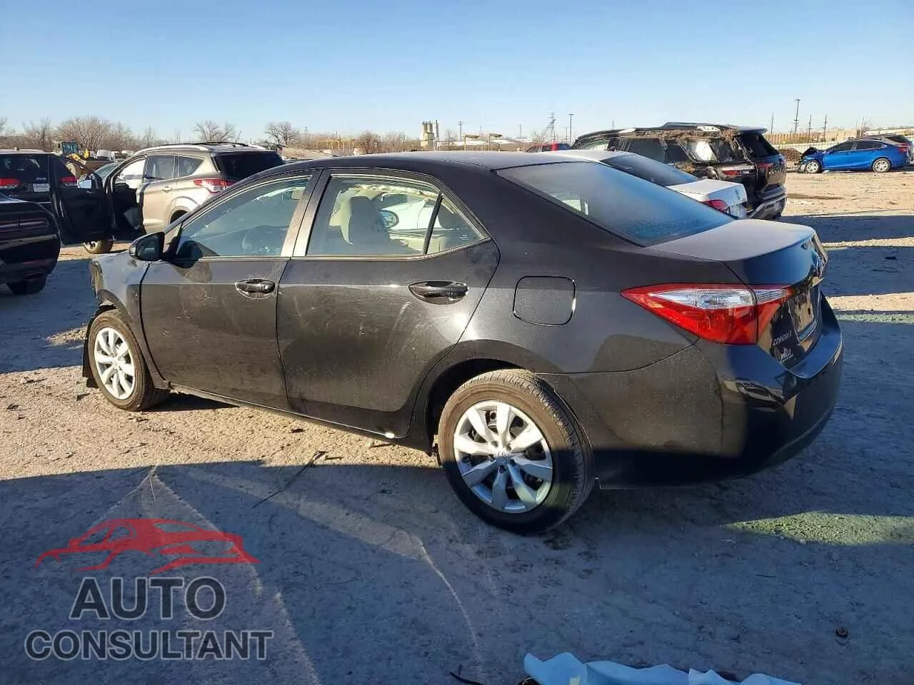 2015 TOYOTA COROLLA Damaged VIN 5YFBURHE9FP251230 – rear exterior 2015 TOYOTA COROLLA Damaged VIN 5YFBURHE9FP251230 – rear exterior